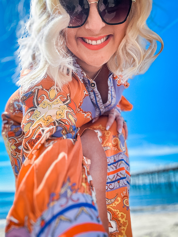 Holly Wood Flourish Mentor attending a business retreat for entrepreneurs in los angeles malibu beach smiling